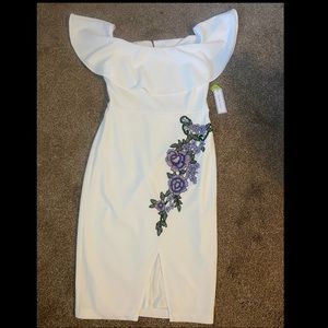 White dress with purple detail